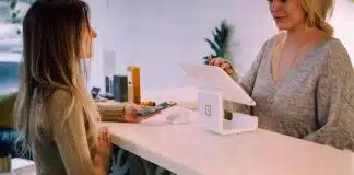 woman standing near monitor